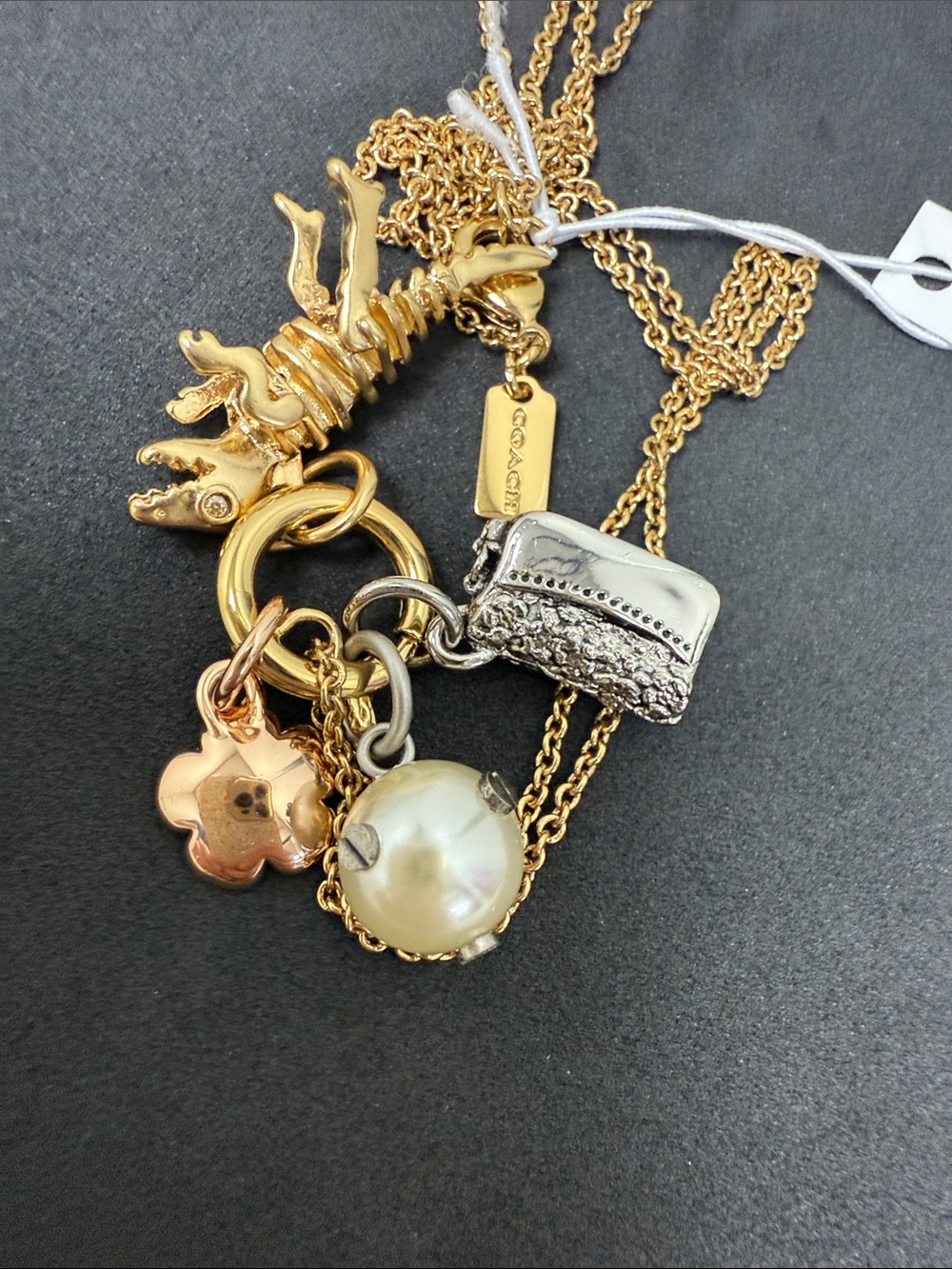 Rare COACH Rexy Gold-Tone Multi-Charm Necklace with Rexy, Pearl & Floral Charms - Picture 7 of 8